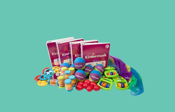 Kindermusik schools curriculum kit with instruments, props, books, and teacher binders. About Kindermusik curricula for schools and early learning environments.